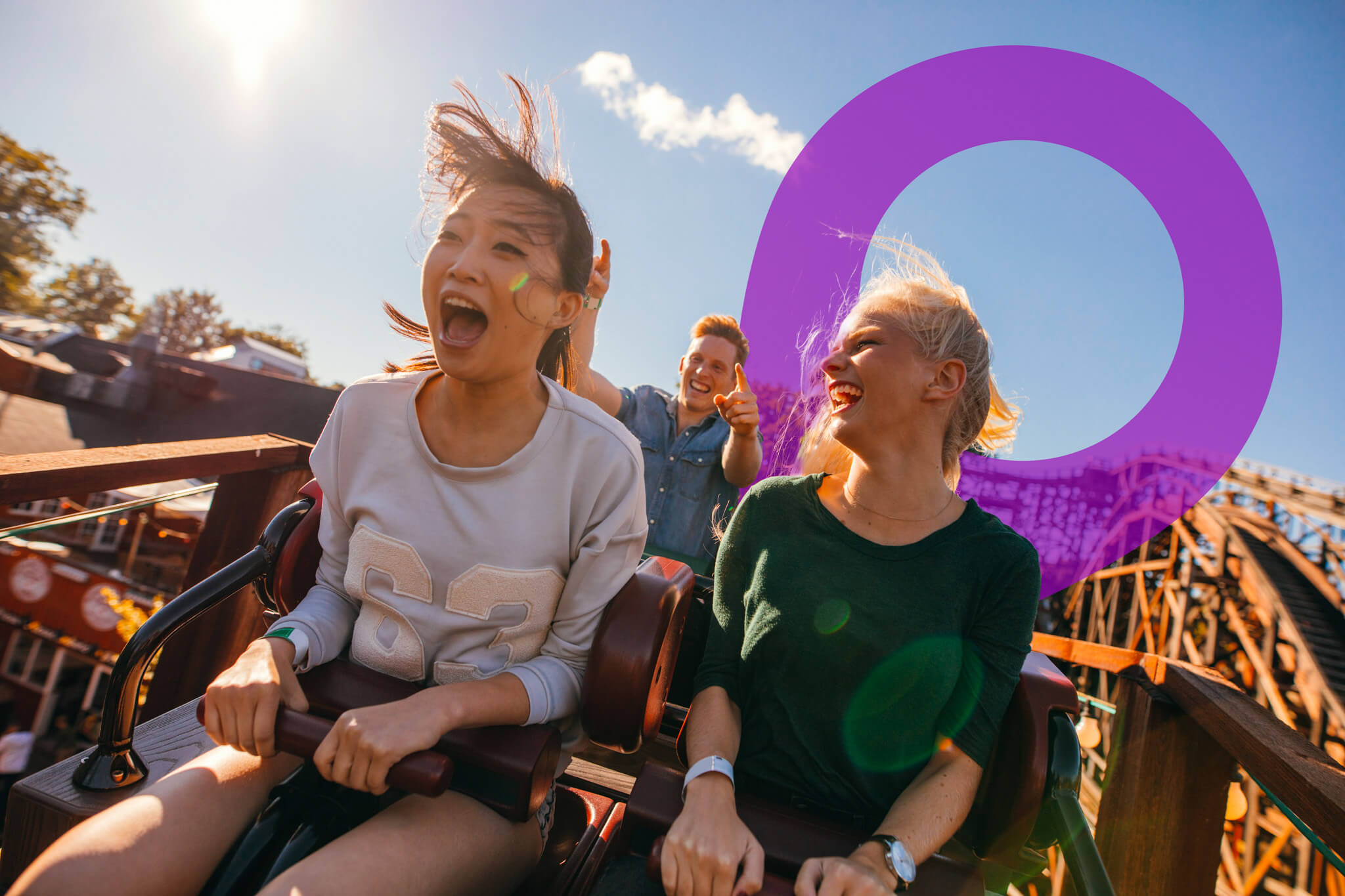 Friends laughing on a rollercoaster at Canada's Wonderland during a thrilling and unforgettable group date experience